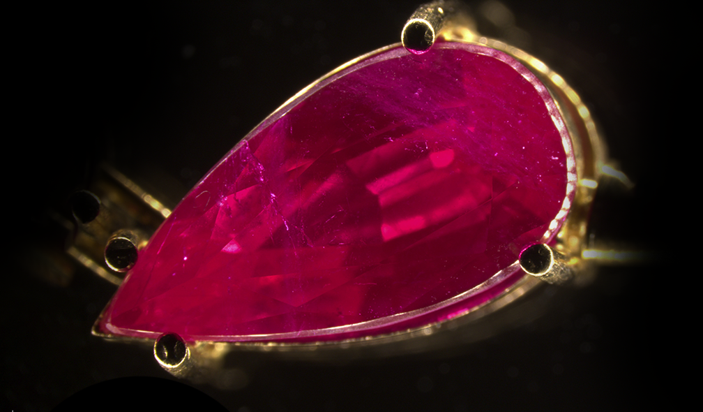 A jewel with a large number of flux-grown synthetic rubies